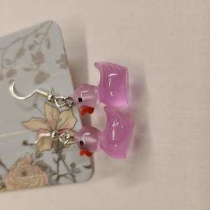 TRANSLUCENT PINK DUCK EARRINGS